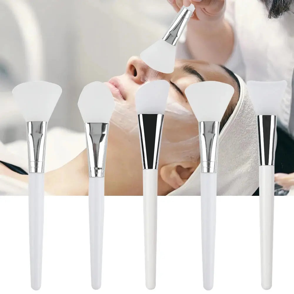 Facial care silicone mask applicator brush set with white heads and white handles