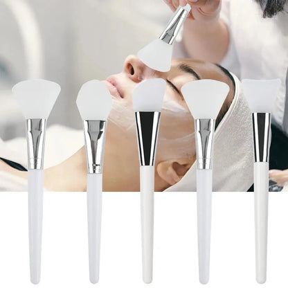 Facial care silicone mask applicator brush set with white heads and white handles