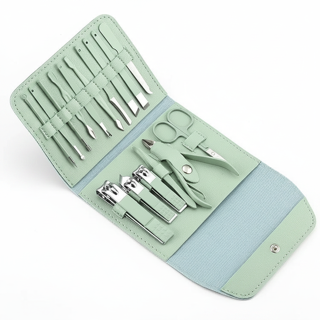 Mint green nail clipper set in open case with scissors, clipper, and grooming tools
