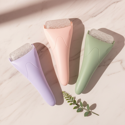 Set of facial ice rollers in purple, pink, and green with textured cooling tops