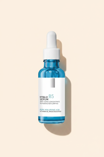 Hydrating serum bottle with dropper, blue glass, Hyalu B5 label on front