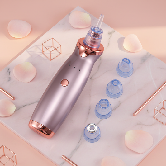 Pore cleansing device on marble tray with blue caps and heart pads
