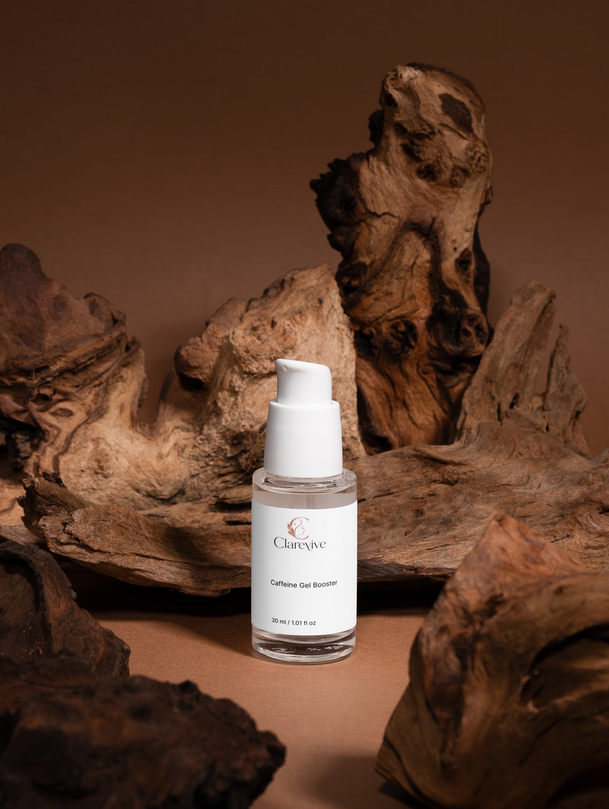 Caffeine gel booster bottle on natural wood sculpture, white pump dispenser